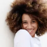 The Psychology of Hair: How Tresses, Textures, and Tones Shape Our First Impressions